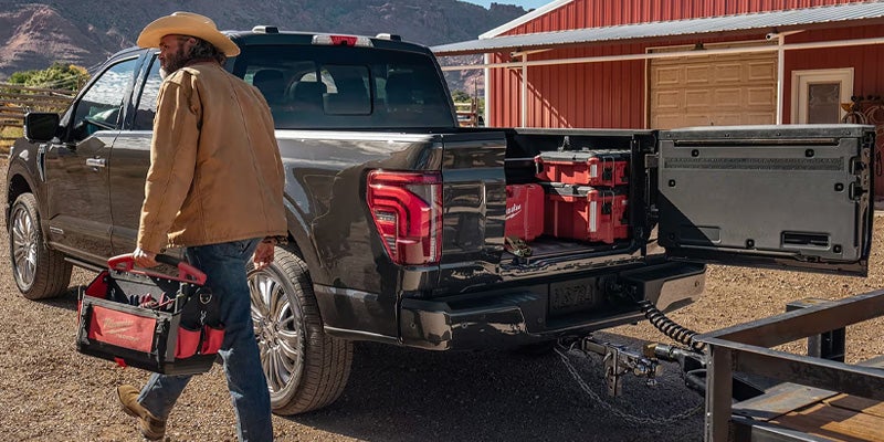 2025 Ford F-150® pickup Pro-Access Tailgate open with gear in the truck bed